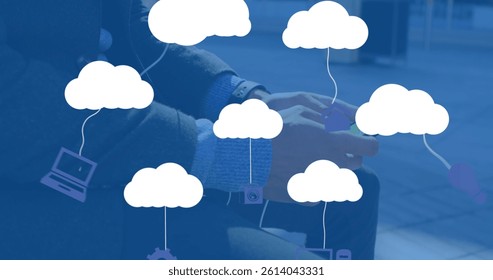 Image of clouds with electronic devices over caucasian businessman using smartphone. global cloud computing, digital interface and data processing concept digitally generated image.