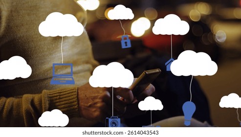 Image of clouds with electronic devices over caucasian man using smartphone. global cloud computing, digital interface and data processing concept digitally generated image.