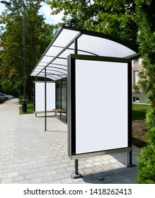 Image Collage Of Bus Shelter At A Bus Stop Of Glass And Aluminum  Frame Structure In Park-like Setting With Green Background And Safety Glass Design. Wooden Benches And White Poster Ad Display Glass