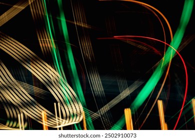 The image is a colorful abstract of lines and shapes, with a mix of green, red, and yellow colors. The lines and shapes seem to be moving and flowing, creating a sense of motion and energy - Powered by Shutterstock - Get 15% off with code: PIKWIZARD15