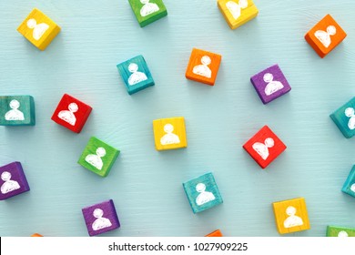 Image Of Colorful Blocks With People Icons Over Wooden Table ,human Resources And Management Concept