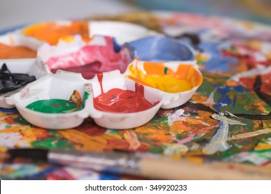 Image of colorful paints on palette for art background