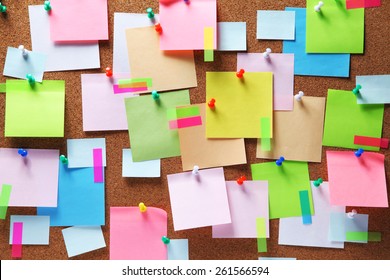 Image of colorful sticky notes on cork bulletin board - Shutterstock ID 261566594