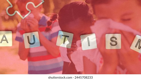 Image of colourful puzzle pieces and autism text over kids friends sneezing noses. autism, learning difficulties, support and awareness concept digitally generated image. - Powered by Shutterstock