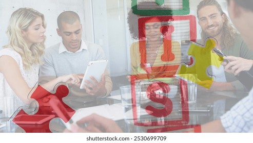 Image of colourful puzzle pieces and autism text over work colleagues using tablets. autism, learning difficulties, support and awareness concept digitally generated image. - Powered by Shutterstock