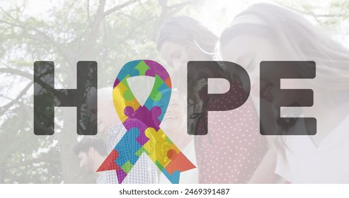 Image of colourful puzzle pieces forming ribbon and hope autism awareness month text over family. autism, learning difficulties, support and awareness concept digitally generated image - Powered by Shutterstock