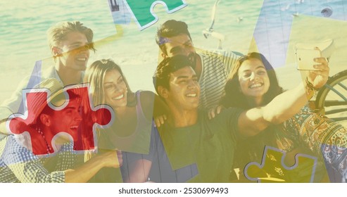 Image of colourful puzzle pieces and human head over happy friends at summer beach party. autism, learning difficulties, support and awareness concept digitally generated image - Powered by Shutterstock