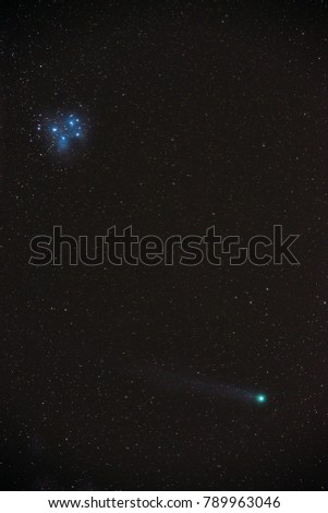Image of comet Lovejoy as it passes through the star cluster the Pleiades, M45 the January 17, 2015.