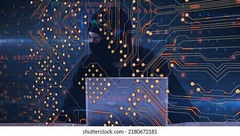 Image of computer circuit board and cyberattack warning over caucasian hacker. Global technology, computing and digital interface concept digitally generated image.