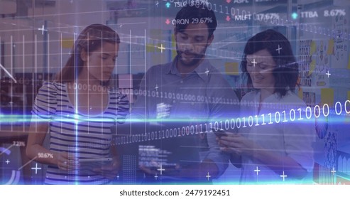 Image of computer language and graphs over diverse man explaining over laptop to women. Digital composite, multiple exposure, database, binary code, business, office, teamwork and technology.