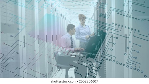 Image of computer motherboard with man and woman talking in computer server room. digital interface global connections concept digitally generated image.