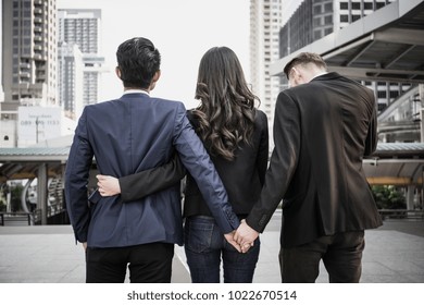 Image concept of a marital infidelity. Business people working together and man try to infidelity his couple.
