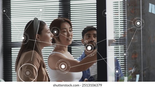 Image of connections and data processing over diverse business people in office. Global finance, business, connections, computing and data processing concept digitally generated image.