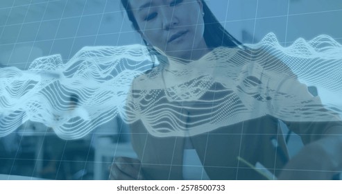 Image of connections and data processing over biracial businesswoman in office. Global finance, business, connections, computing and data processing concept digitally generated image.