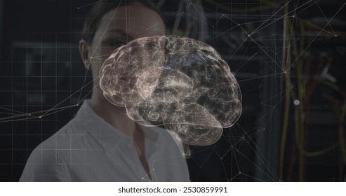 Image of connections and digital brain over caucasian woman in server room. Global technology, online security and digital interface concept digitally generated image. - Powered by Shutterstock