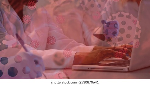 Image of coronavirus cells and data flowing over a female laboratory worker group working with her laptop computer. Covid 19 pandemic health care science medicine concept digital composite. - Powered by Shutterstock