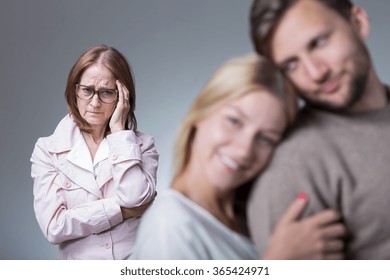 Image Of Couple In Love And Overprotective Envy Mother