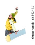 Image of courageous guy jumping on snowboard in the air