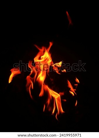 The image I created is a digital artwork of a fire. The artwork is composed of orange and yellow flames with black smoke rising from the center of the image. The flames are depicted in a stylized mann
