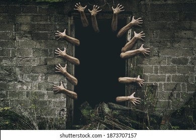 Image of a creepy hands emerging from the open haunted house door. Ghost hands.