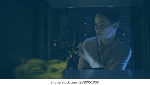 Image of crypto text and data processing over caucasian female it engineer by computer servers. Global data processing, servers and cloud computing concept digitally generated image.