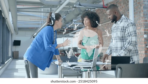 Image of currency icons and data processing over diverse business people in office. Global finance, business, connections, computing and data processing concept digitally generated image.