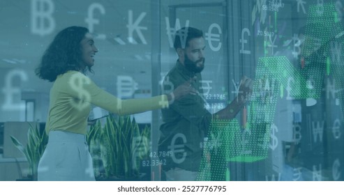 Image of currency symbols financial data processing over diverse business people in office. Global finance, business, connections, computing and data processing concept digitally generated image. - Powered by Shutterstock