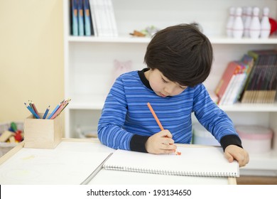 The Image Of Cute Asian Kid Drawing