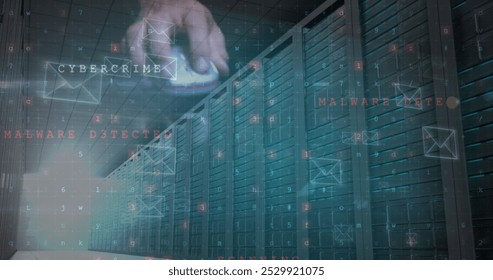 Image of cyberattack and envelope icons over and using computer mouse server room. global data processing, computing and digital interface concept digitally generated image.