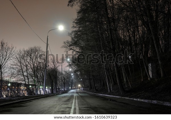 image of a dark night
road