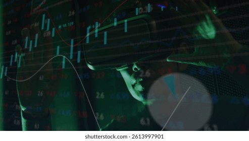 Image of data over asian male it engineer with vr headset by computer server. data processing, cloud computing concept and technology concept digitally generated image.