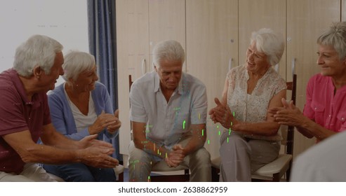 Image of data over diverse male and female rotating business colleagues clapping hands in office. Global business digital interface technology and networking concept digitally generated image.