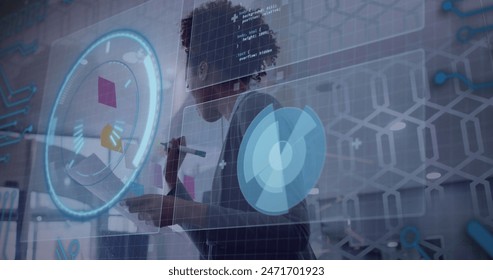 Image of data processing against african american woman wiriting on memo notes at office. Computer interface and business technology concept