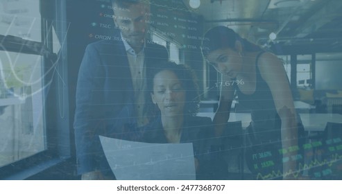 Image of data processing against diverse businesspeople discussing over document at office. Global economy and business data technology concept