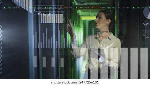 Image of data processing against thoughtful caucasian female engineer working at server room. Business data storage technology concept
