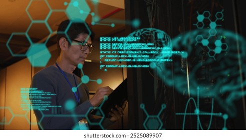 Image of data processing with brains over asian businessman in server room. Global science, technology, computing and digital interface concept digitally generated image.