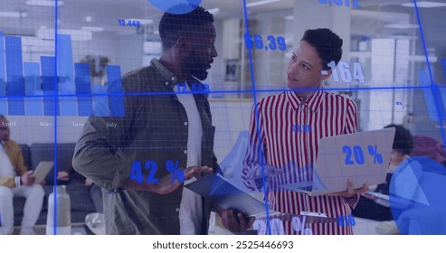 Image of data processing and diagrams over diverse colleagues discussing work. Global business and digital interface concept digitally generated image.