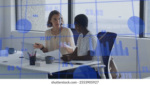 Image of data processing and diagrams over diverse colleagues discussing work. Business, technology and digital interface concept digitally generated image.