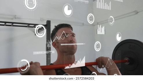 Image of data processing and diagrams over caucasian man lifting weight bar at gym. Global sport and digital interface concept digitally generated image.