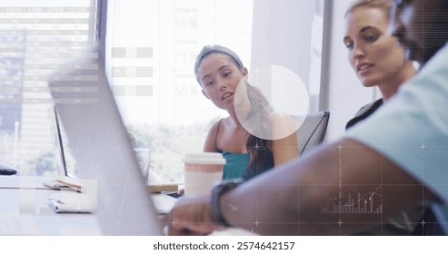 Image of data processing and diagrams over diverse colleagues talking in office. Global business and digital interface concept digitally generated image.