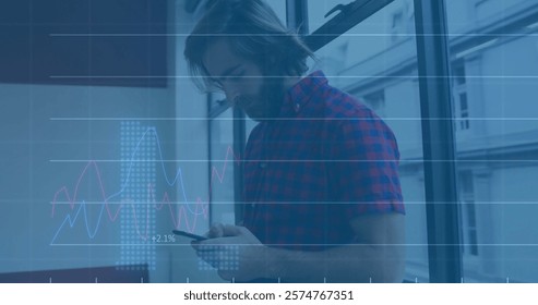 Image of data processing and diagrams over caucasian man using smartphone. Technology, business and digital interface concept digitally generated image. - Powered by Shutterstock - Get 15% off with code: PIKWIZARD15