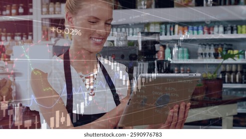 Image of data processing and diagrams over caucasian female barista using tablet in cafe. Global business, technology and digital interface concept digitally generated image.