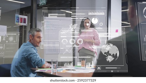 Image of data processing and diagrams over diverse colleagues discussing work. Technology, business and digital interface concept digitally generated image.