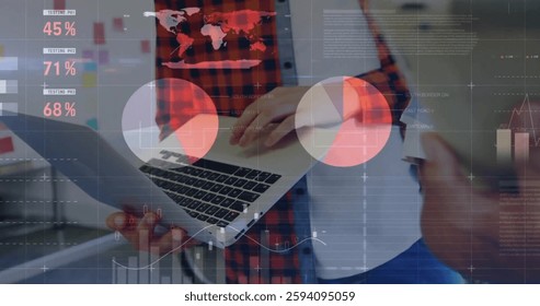 Image of data processing and diagrams over diverse colleagues using laptop and tablet. Global business and digital interface concept digitally generated image.