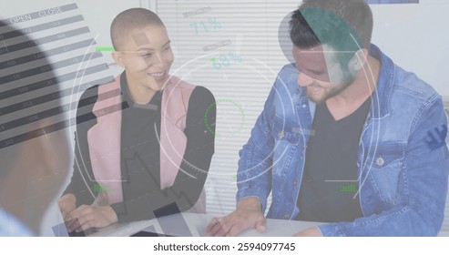 Image of data processing and diagrams over diverse colleagues talking in office. Global business and digital interface concept digitally generated image.