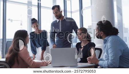 Image of data processing and diagrams over diverse colleagues discussing work in office. Technology, business and digital interface concept digitally generated image.