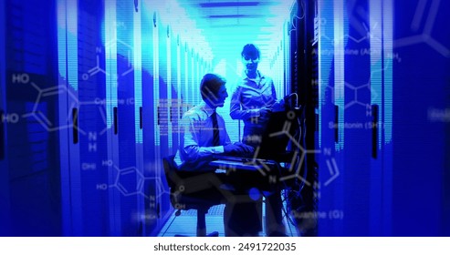 Image of data processing with diverse it technicians by computer servers. Global computing, digital interface and data processing concept digitally generated image. - Powered by Shutterstock - Get 15% off with code: PIKWIZARD15