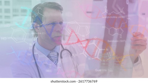 Image of data processing and dna strand spinning over caucasian male doctor. global medicine, research, healthcare, digital interface and data processing concept digitally generated image.