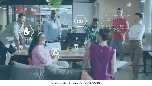 Image of data processing and ecology icons over diverse colleagues discussing work in office. Global business and digital interface concept digitally generated image.