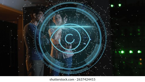 Image of data processing and eye icon over diverse workers in server room. Computer security day and celebration concept digitally generated image.